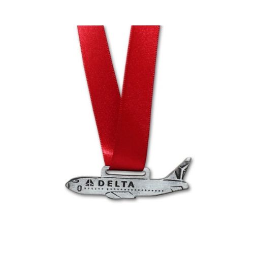 Medalla metálica Avión Delta